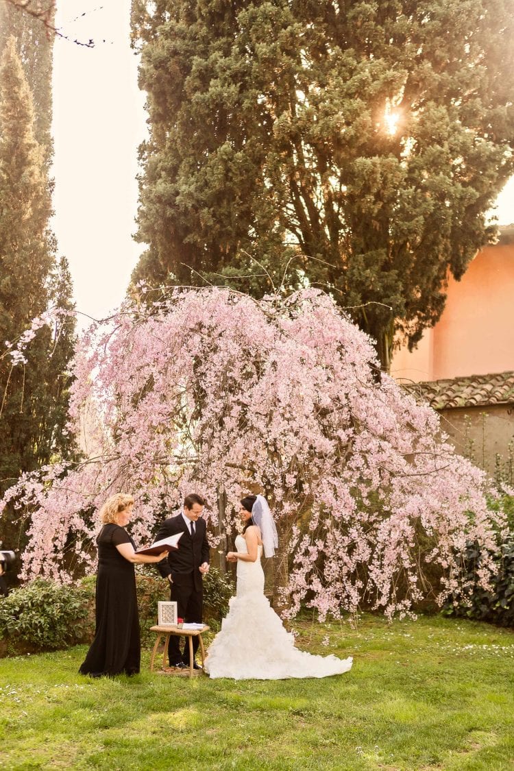 a moment from the symbolic ceremony at Torre di Bellosguardo in Florence, Italy