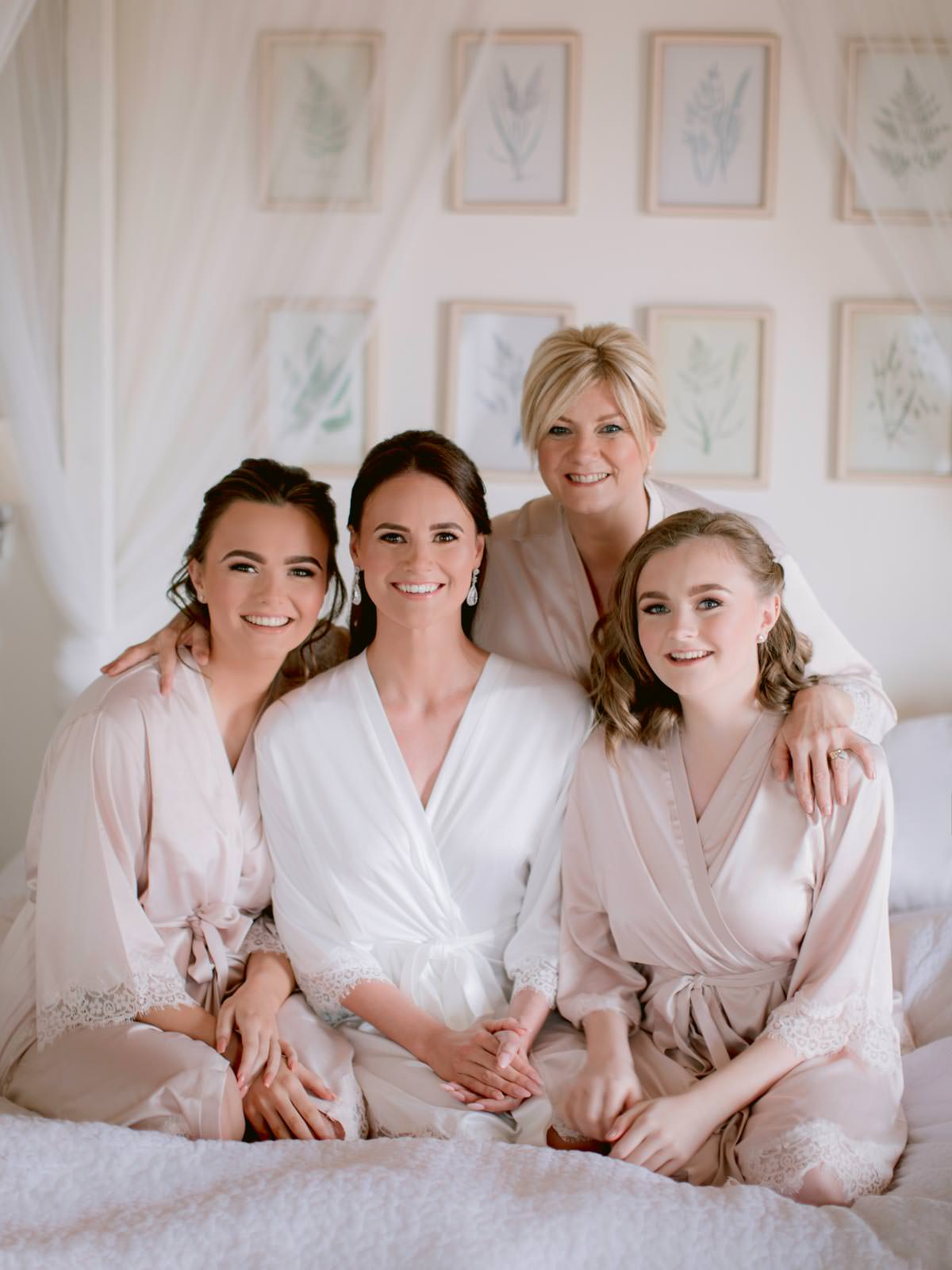 the beautiful bride with her mum and bridesmaids