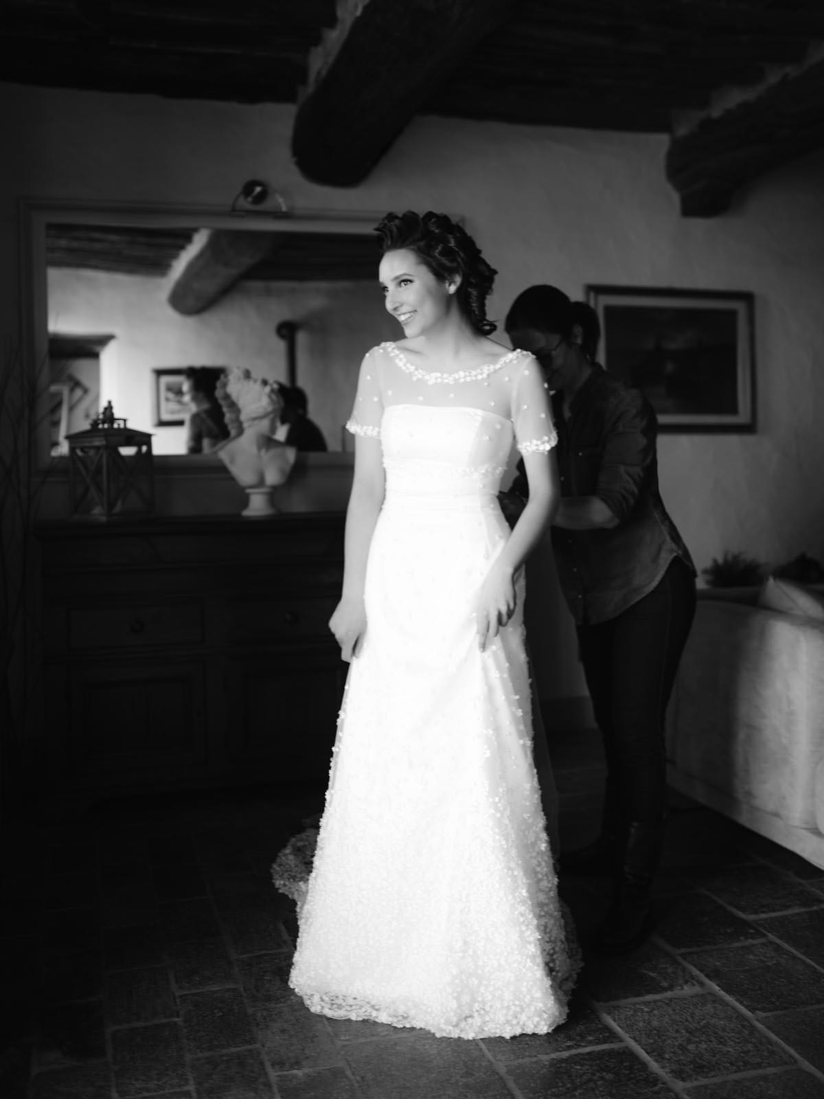 bride is getting ready for her wedding in Tuscany