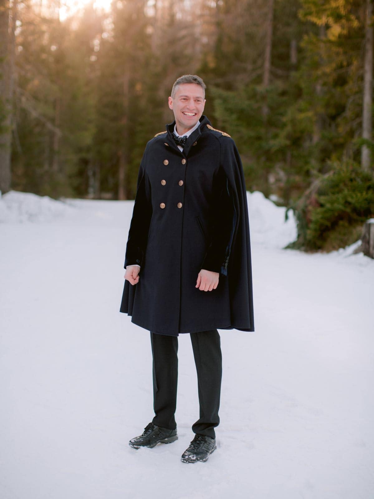 the perfect groom's suit for a winter wedding on the snow